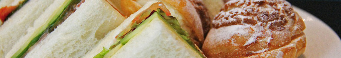Eating Sandwich at Bon Fresco restaurant in Columbia, MD.